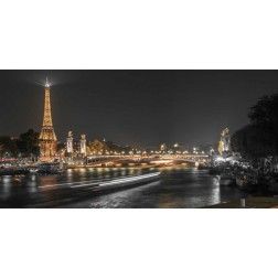 View of the river Seine with the Pont Alexandre III and Eiffel Tower in the background during night,